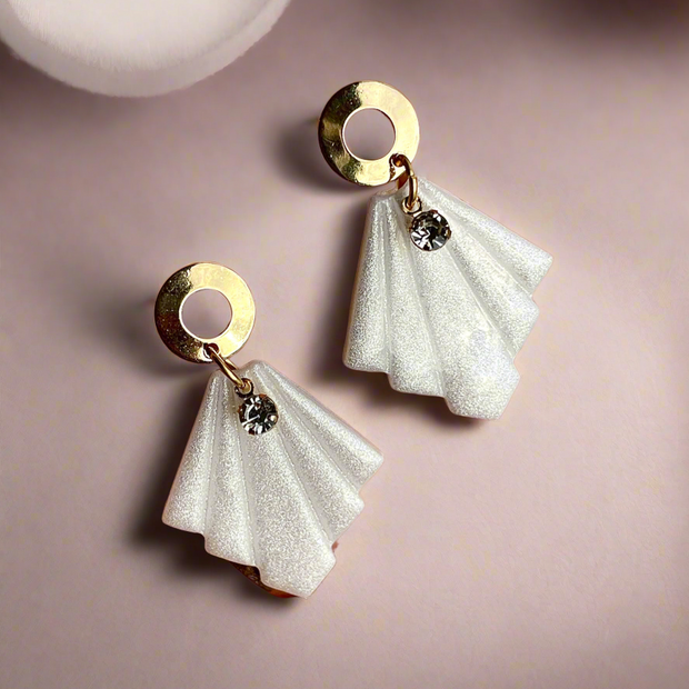 Glossy minimalistic earrings with pearl effect and zircon