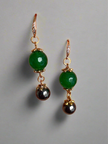Jade and black onyx dangle earrings