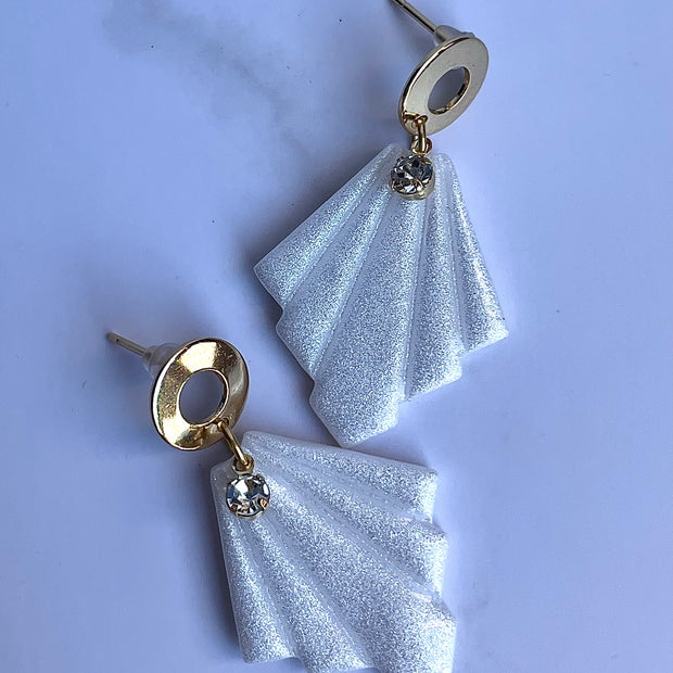 Glossy minimalistic earrings with pearl effect and zircon