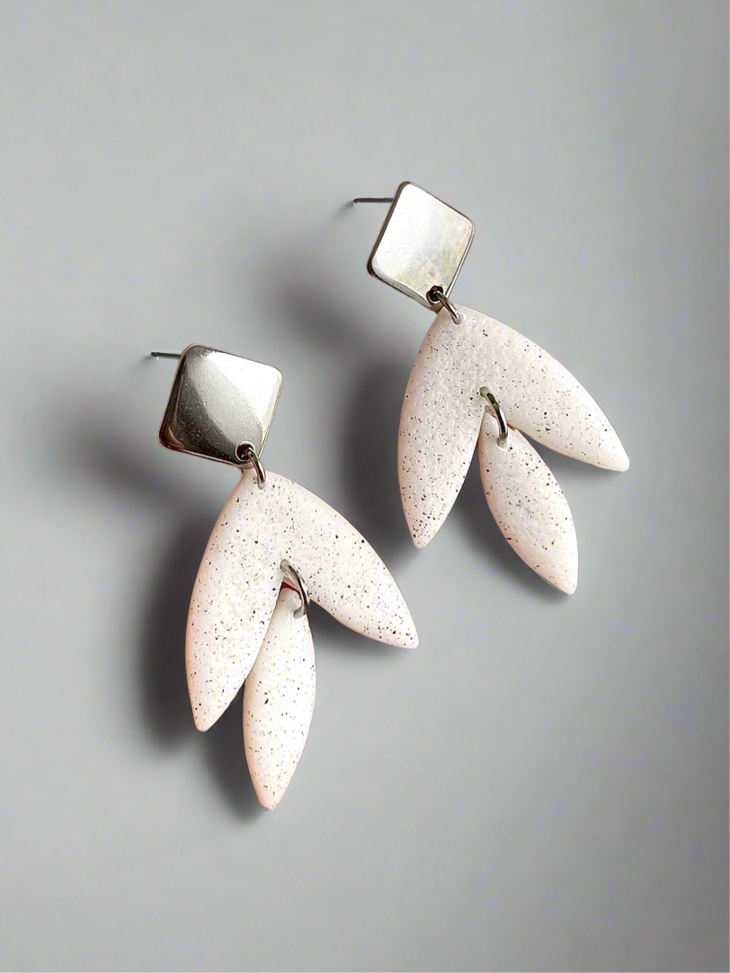 Matt textured leaf earrings with black speckles