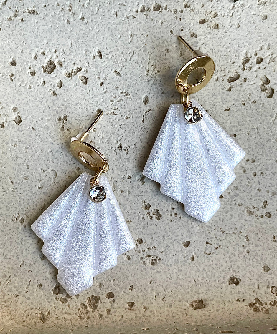 Glossy minimalistic earrings with pearl effect and zircon