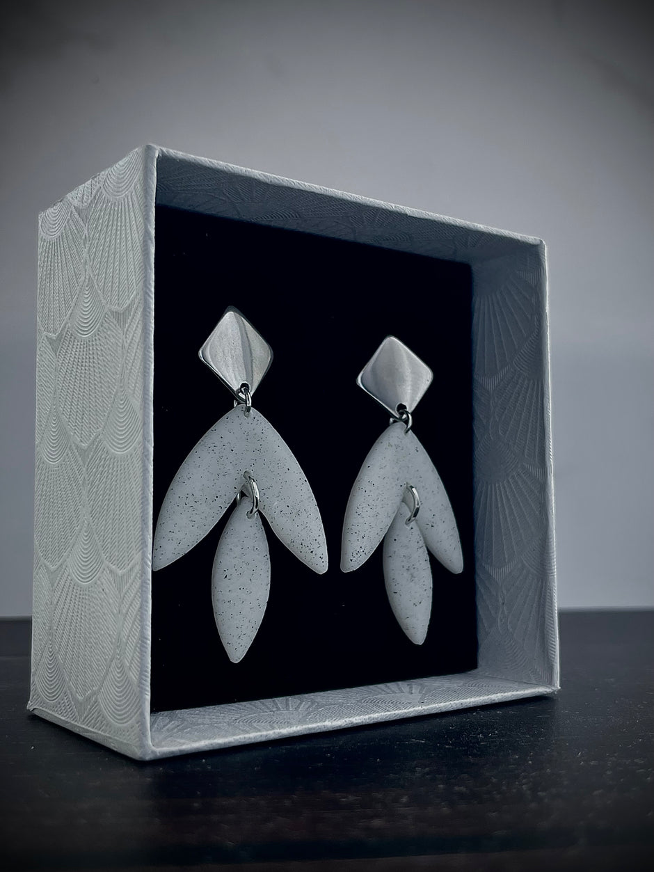 Matt textured leaf earrings with black speckles