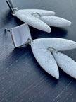 Matt textured leaf earrings with black speckles
