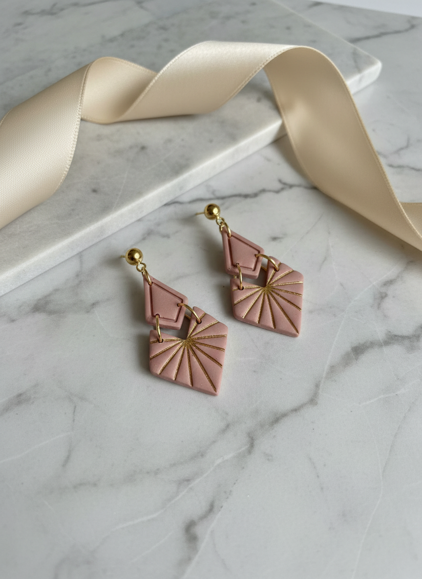 Dusty pink geometric earrings with luxe styling