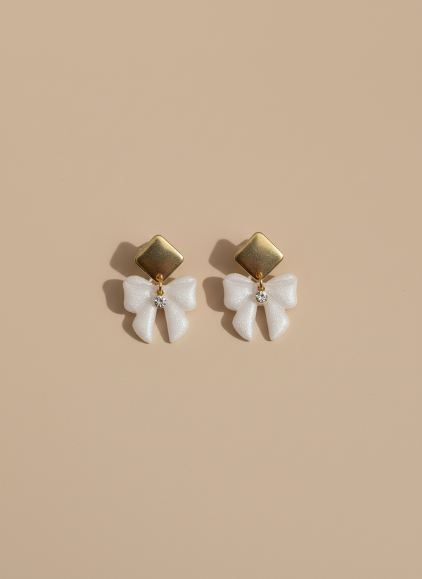 Earrings on neutral background