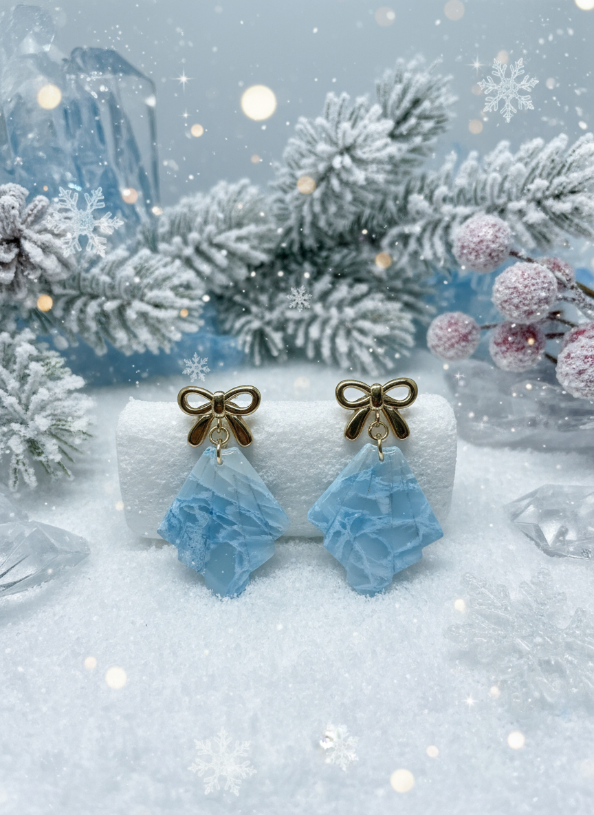 Frosted earrings with festive winter Christmas background