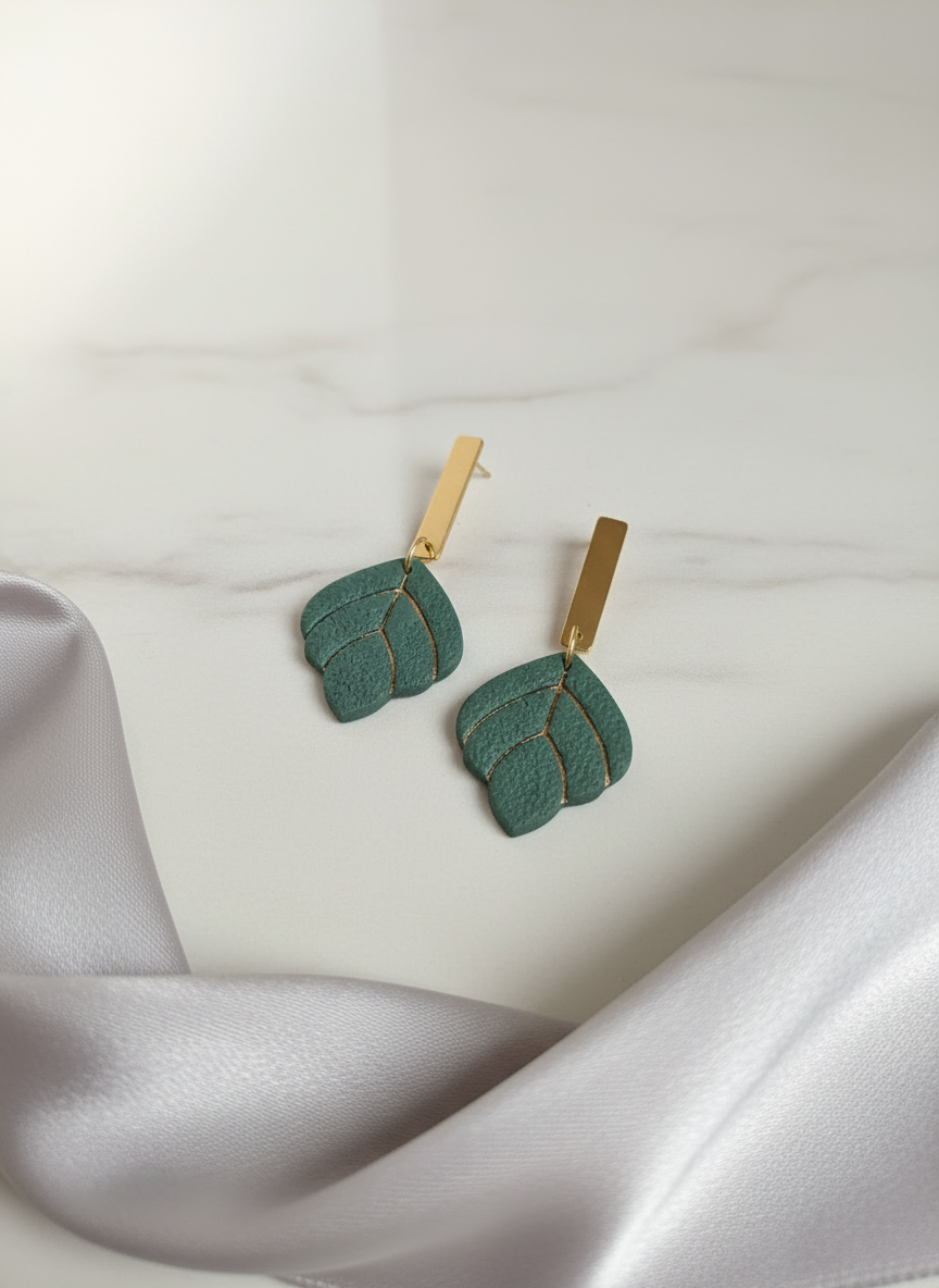Green earrings with luxe styling