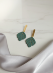 Green earrings with luxe styling