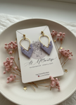 Lavender earrings on ceramic with pink flowers