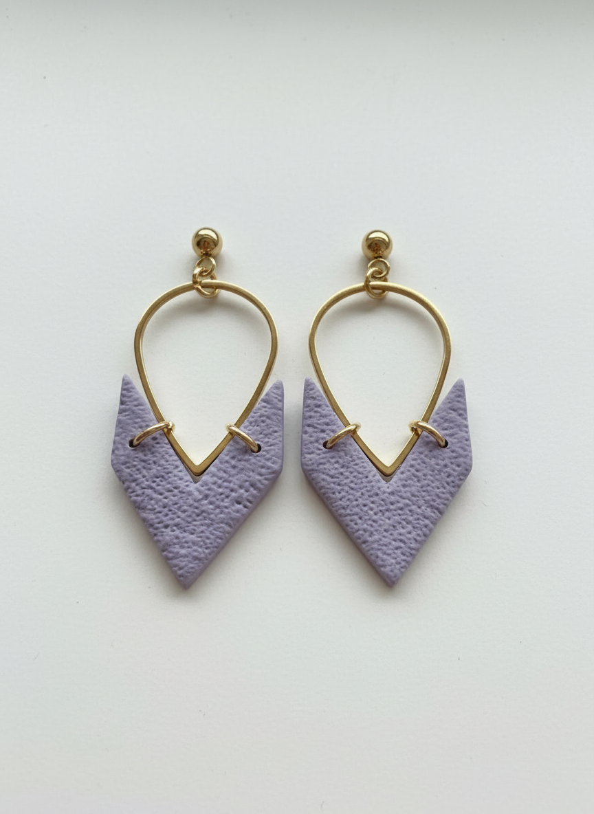 Lavender purple earrings on white background
