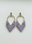Lavender purple earrings on white background