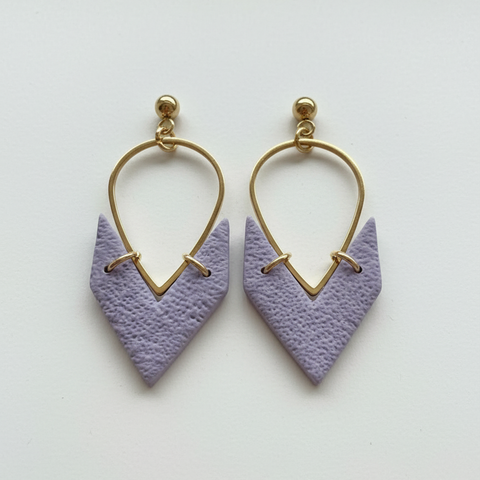 Lavender purple earrings on white background