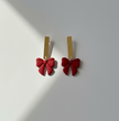 Red Bow Earrings Commercial Background
